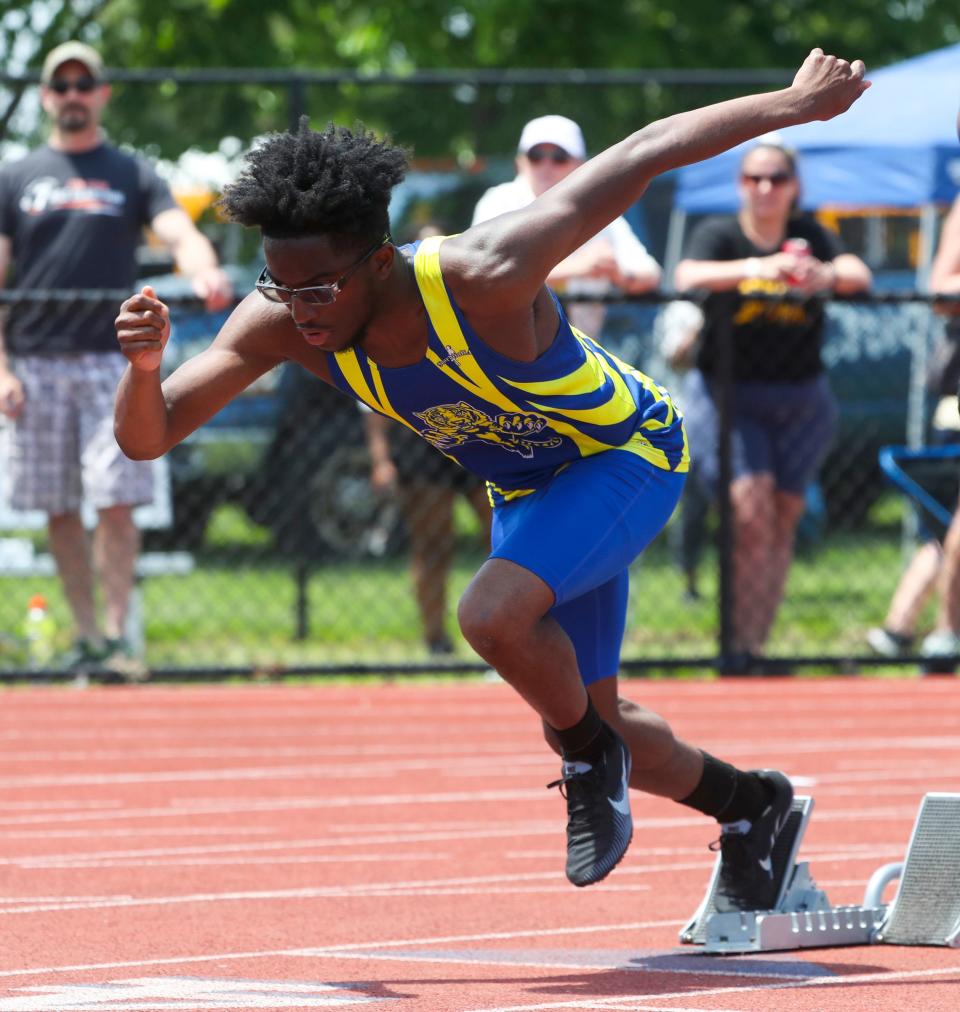 A.I. du Pont's Devon George breaks from the blocks at the start of his winning performance in the Division II 400-meter dash during the DIAA state high school track and field championships Saturday, May 21, 2022 at Dover High School.