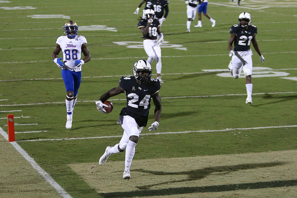 D.J. Killings returns an interception for a touchdown vs. Tulsa last November. (Getty Images)