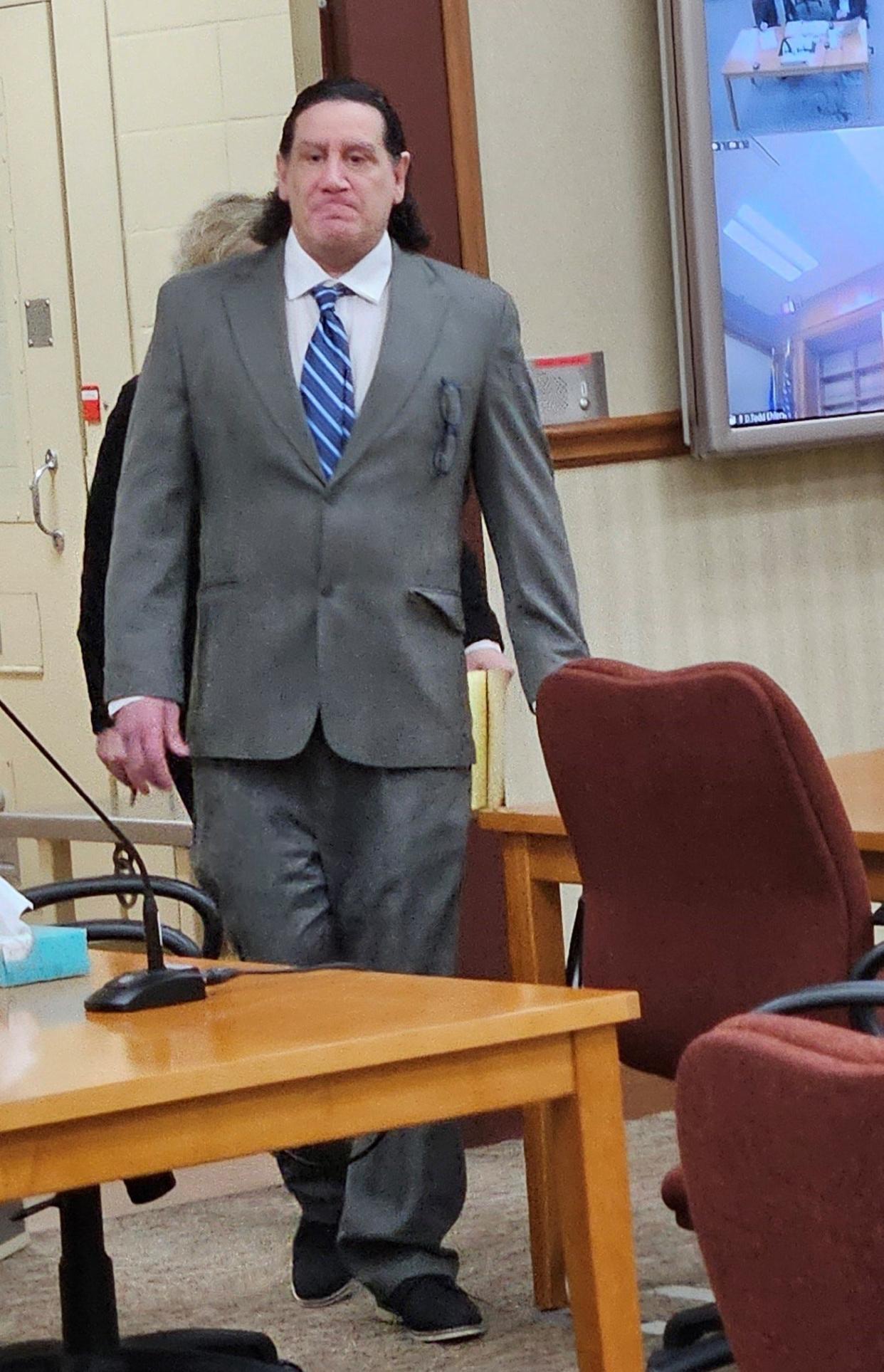 Anthony Gonzalez comes into court at the Door County Justice Center on Tuesday morning, during his trial for the Feb. 22, 2002, fire that destroyed Butch's Bar in downtown Sturgeon Bay and resulted in the deaths of two men living above the bar.