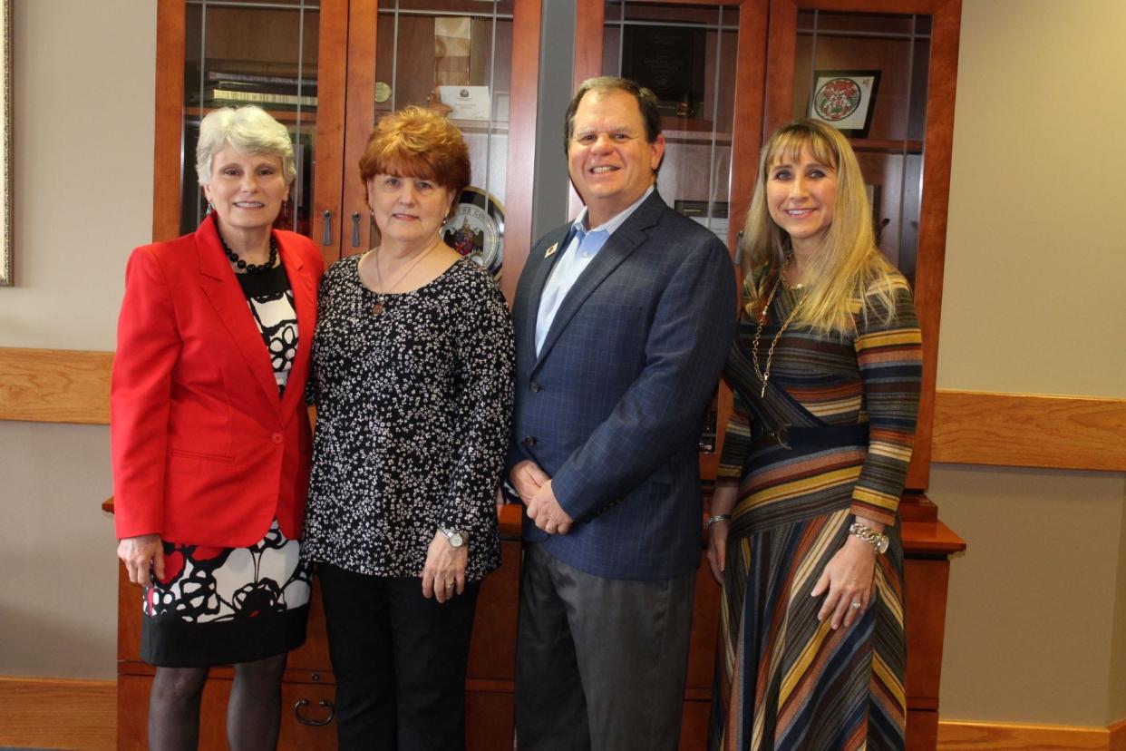 Sherry Wofford, second from left, recently presented a $26,000 endowment to Gadsden State Community College. Also seen are, from left, president of Gadsden State Dr. Kathy Murphy, president of the Cardinal Foundation Mark Condra and executive vice president of Gadsden State Dr. Tera Simmons.