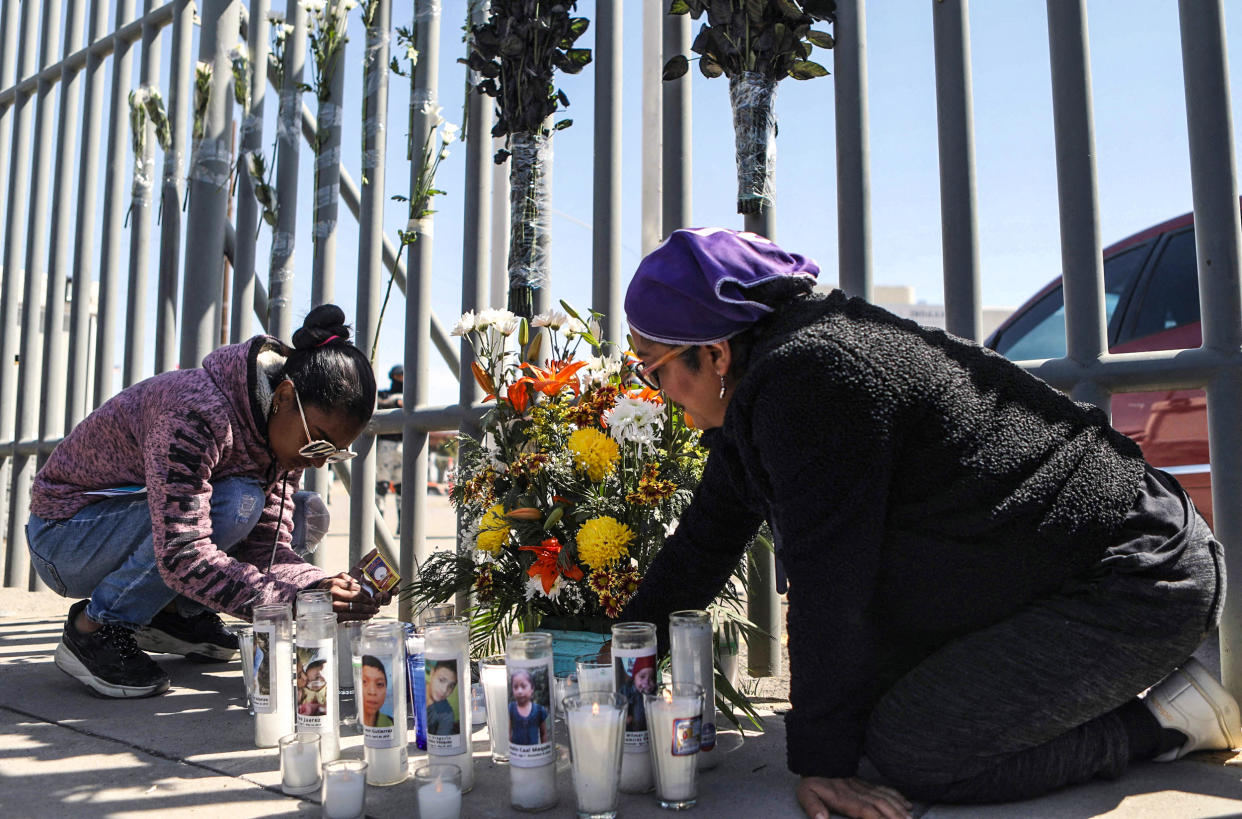 Image: Activists and migrants lay a floral offering on a makeshift altar during a protest outside an immigration detention center in Ciudad Juarez, Chihuahua state, Mexico, on March 28, 2023. (Herika Martinez / AFP - Getty Images)