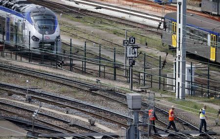 A new Regiolis regional train (L) made by power and train-making firm Alstom, is seen next to a platform at Strasbourg's railway station, May, 21, 2014. REUTERS/Vincent Kessler