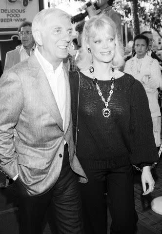 <p>Pierre-Gilles Vidoli/Variety/Penske Media via Getty</p> Aaron Spelling and Candy Spelling at the 1984 premiere of 'Ghostbusters'