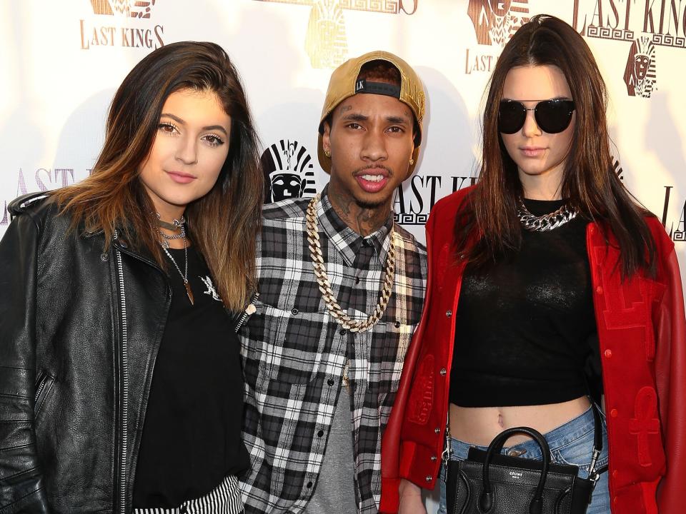 Kylie Jenner, rapper Tyga, and television personality Kendall Jenner attend the exclusive press preview of Tyga's new store, Last Kings Flagship Store, on February 20, 2014 in Los Angeles, California