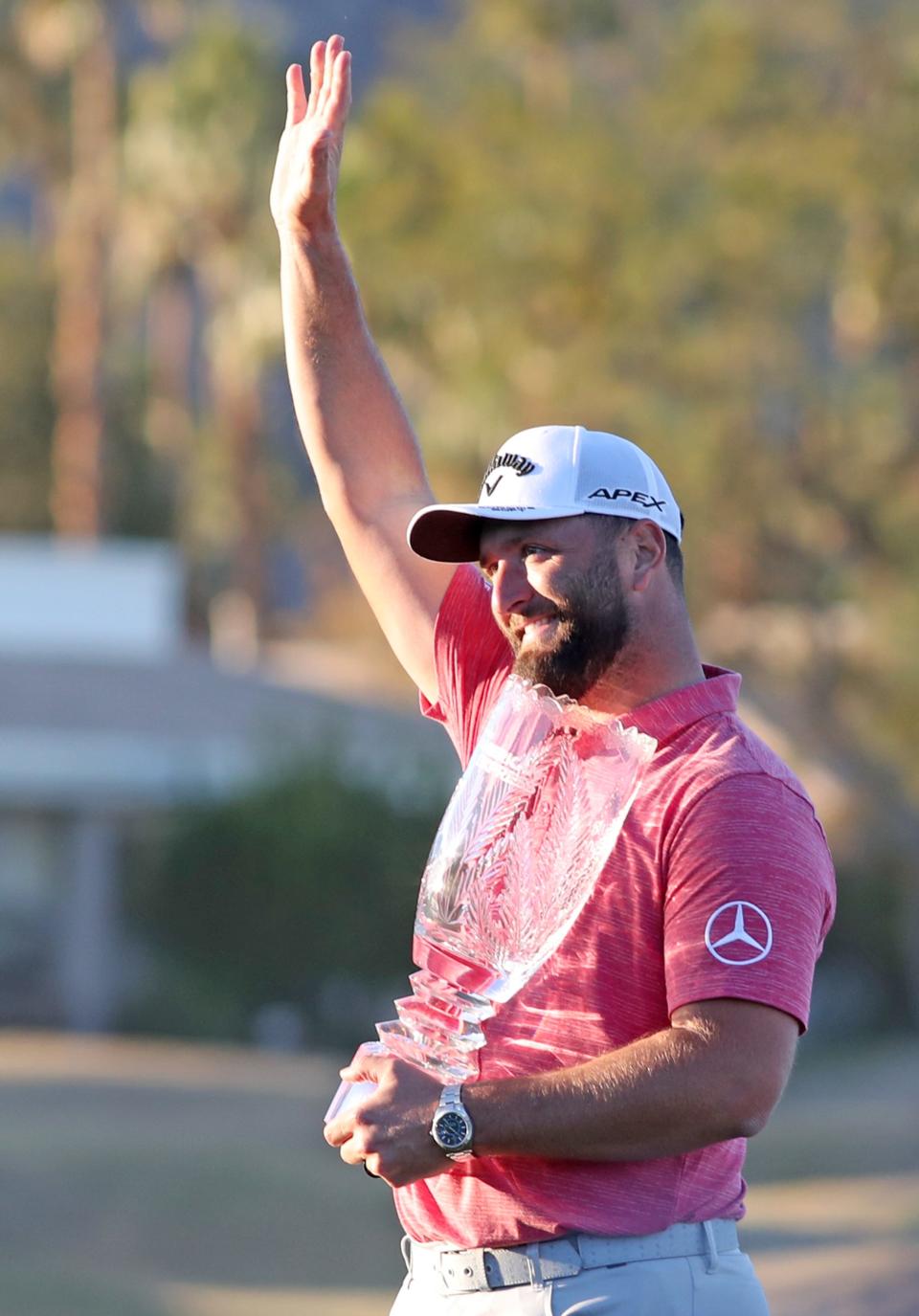 Jon Rahm holds the trophy after his win at The American Express in La Quinta, Calif., on Sunday, Jan. 22, 2023. 