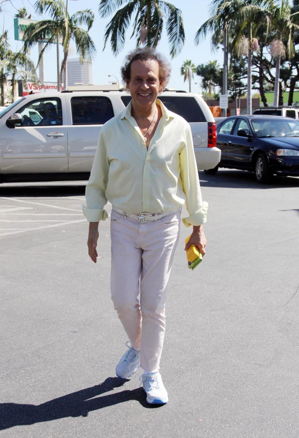 RICHARD SIMMONS DANCING IN A PARKING LOT