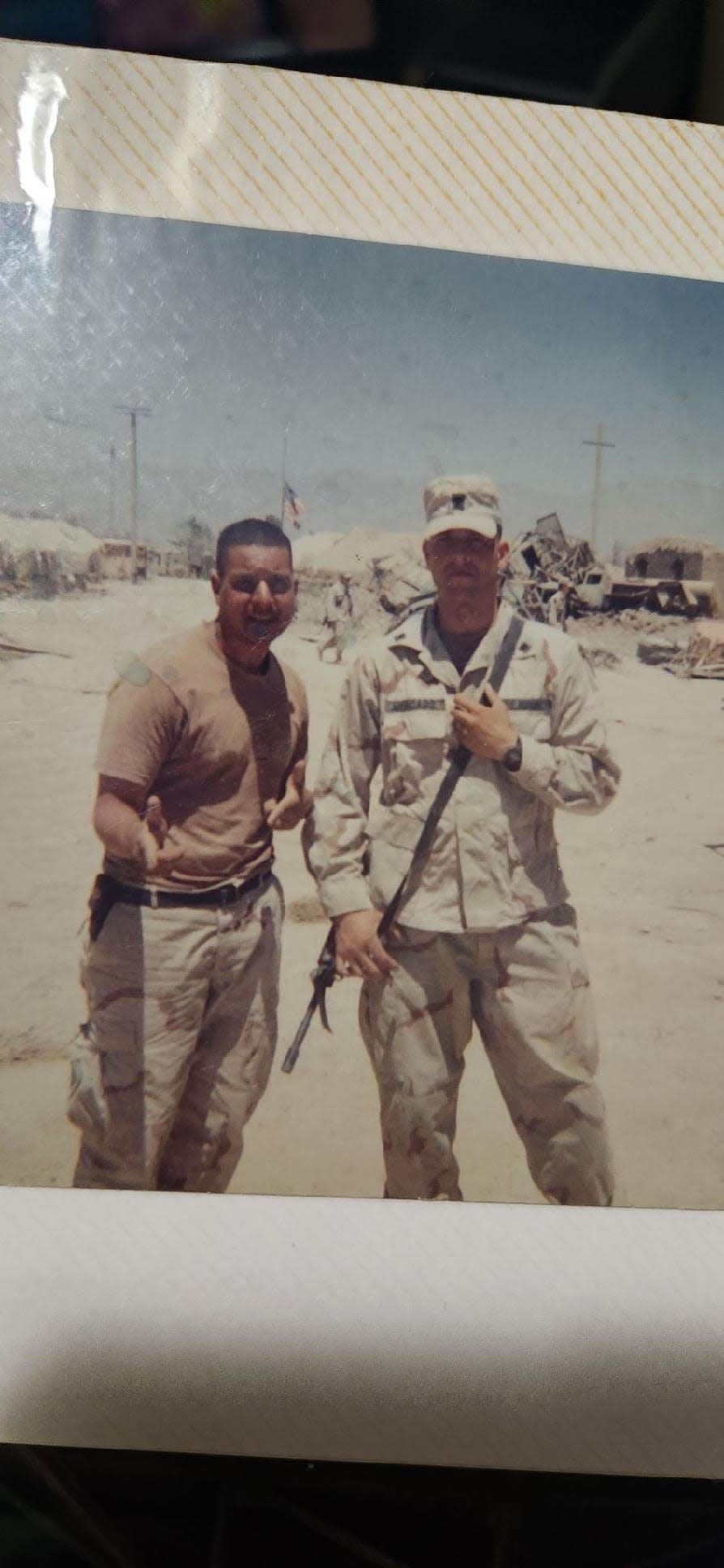 Gil Mercado of Paterson died in Iraq in April 2003. He is seen in photo wearing hat and weapon with his brother Alnardo Rivera while both served previously in Afghanistan.
