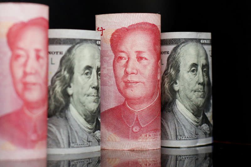 FILE PHOTO: Illustration picture of Chinese yuan and U.S. dollar banknotes