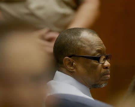 Defendant Lonnie Franklin Jr. listens while Deputy District Attorney Beth Silverman details the prosecution's case against him during closing arguments in the so-called "Grim Sleeper" case a serial murder trial in Los Angeles, California, U.S. May 2, 2016. REUTERS/Mark Boster/ Los Angeles Times/Pool