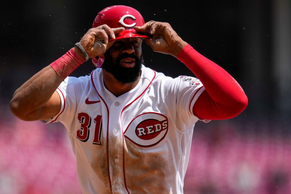 Cincinnati Reds outfielder Henry Ramos (31) scores on a fielders choice off the bat of Kevin Newman in the second inning of the MLB Interleague game between the Cincinnati Reds and the Texas Rangers at Great American Ball Park in downtown Cincinnati on Wednesday, April 26, 2023.