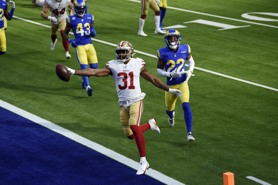 San Francisco 49ers running back Raheem Mostert scores a rushing touchdown against the Los Angeles Rams during the first half of an NFL football game Sunday, Nov. 29, 2020, in Inglewood, Calif. (AP Photo/Kelvin Kuo)