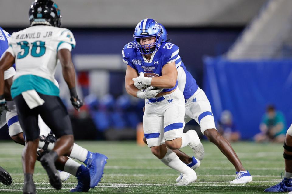 Georgia State running back Tucker Gregg (26) runs with the ball against Coastal Carolina on Sept. 22, 2022, in Atlanta.