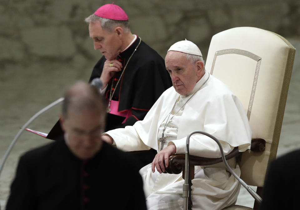 Pope Francis sits in the Paul VI Hall at the Vatican during his weekly general audience, Wednesday, Feb. 20, 2019. (AP Photo/Alessandra Tarantino)