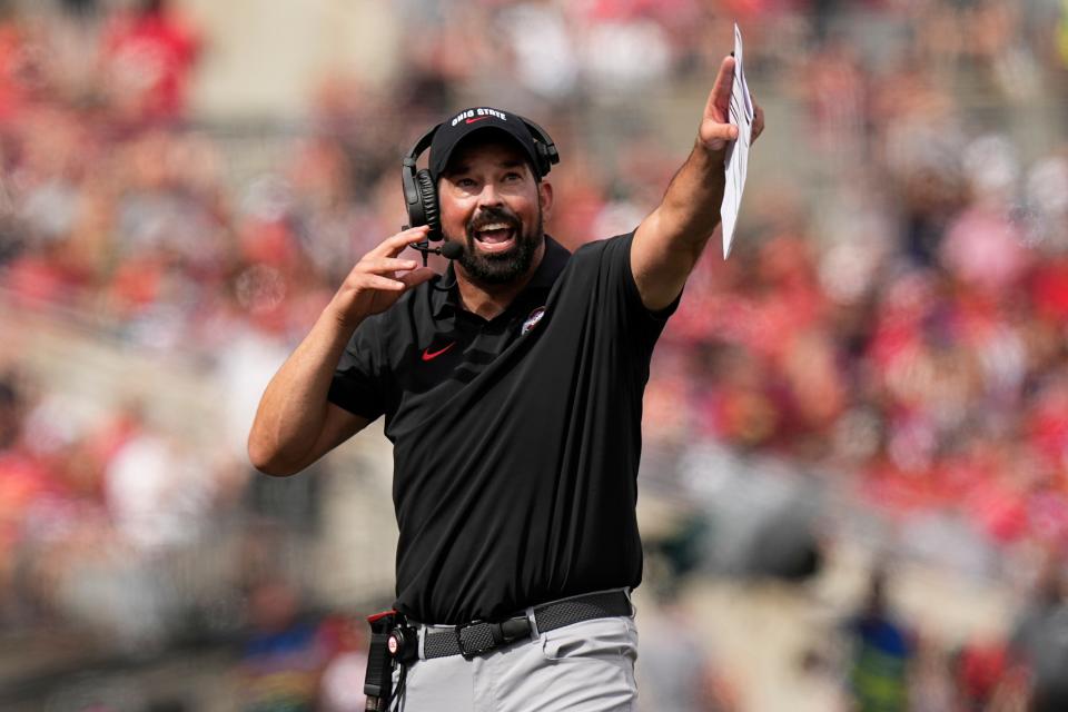 Aug 31, 2024; Columbus, OH, USA; Ohio State Buckeyes head coach Ryan Day yells for a review of a catch by wide receiver Emeka Egbuka during the first half of the NCAA football game against the Akron Zips at Ohio Stadium.