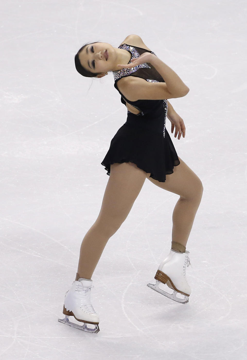 Mirai Nagasu competes during the women's free skate at the U.S. Figure Skating Championships in Boston, Saturday, Jan. 11, 2014. (AP Photo/Elise Amendola)