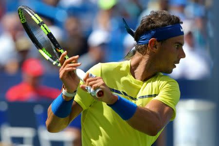 Aug 18, 2017; Mason, OH, USA; Rafael Nadal (ESP) returns a shot against Albert Ramos-Vinolas (ESP) during the Western and Southern Open at the Lindner Family Tennis Center. Mandatory Credit: Aaron Doster-USA TODAY Sports