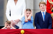 <p>Charlotte and Louis cover their ears while watching the flypast following the Trooping the Colour ceremony. (Getty Images)</p> 