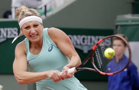 Tennis - French Open - Roland Garros - Venus Williams of the U.S. v Timea Bacsinszky of Switzerland - Paris, France - 1/06/16. Bacsinszky returns a shot. REUTERS/Jacky Naegelen