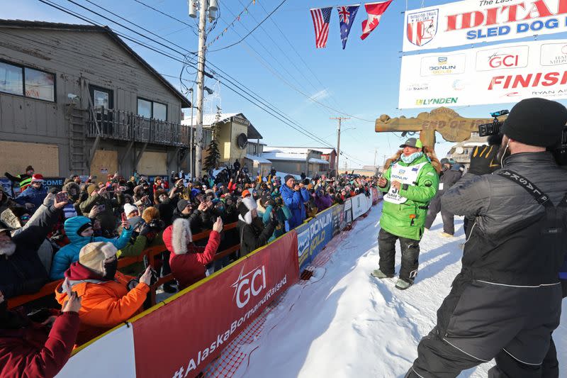 Winner Ryan Redington arrives at the Iditarod Trail Sled Dog race finish line