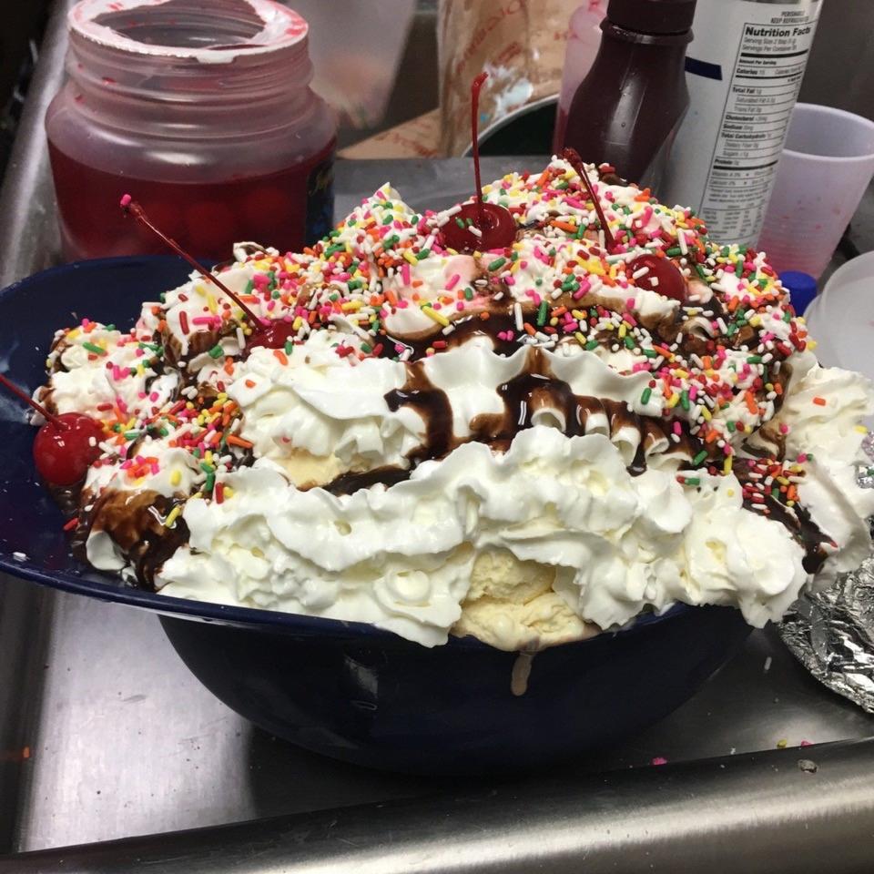 The Screamer is a 5-pound ice cream sundae made up of a 1-pound brownie, topped with 21 scoops of ice cream, four bananas, and covered in hot fudge, whipped cream and sprinkles.
