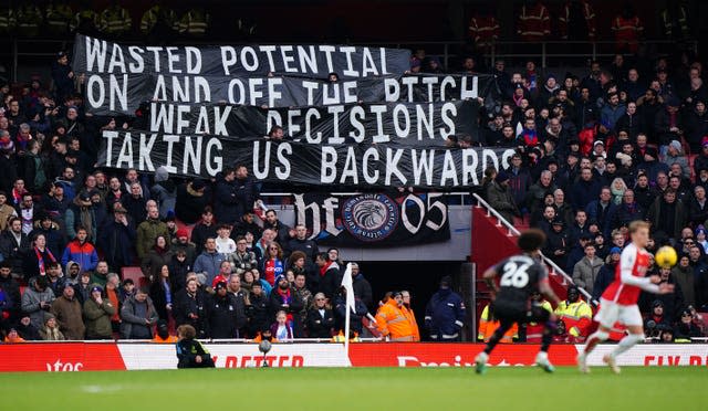 Crystal Palace fans unveil a banner in the stands