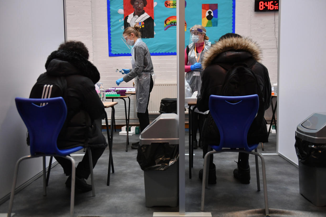 Students take Lateral Flow Tests for coronavirus at the Jewellery Quarter Academy in Birmingham in the West Midlands, as pupils in England return to school for the first time in two months as part of the first stage of lockdown easing. Picture date: Monday March 8, 2021.