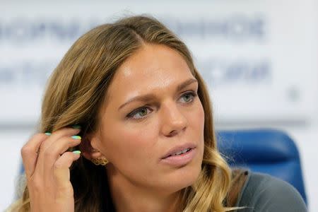 Russia's Olympic medalist Yulia Efimova, who won silver medals for Women's Swimming 100m and 200m Breaststroke, attends a news conference in Moscow, Russia August 24, 2016. REUTERS/Maxim Zmeyev