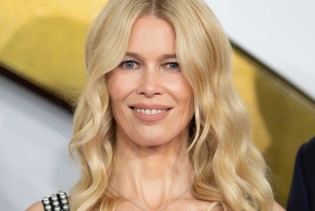 Claudia Schiffer is showing off flat abs in a floral bikini while on vacation. (Photo by Samir Hussein/WireImage)