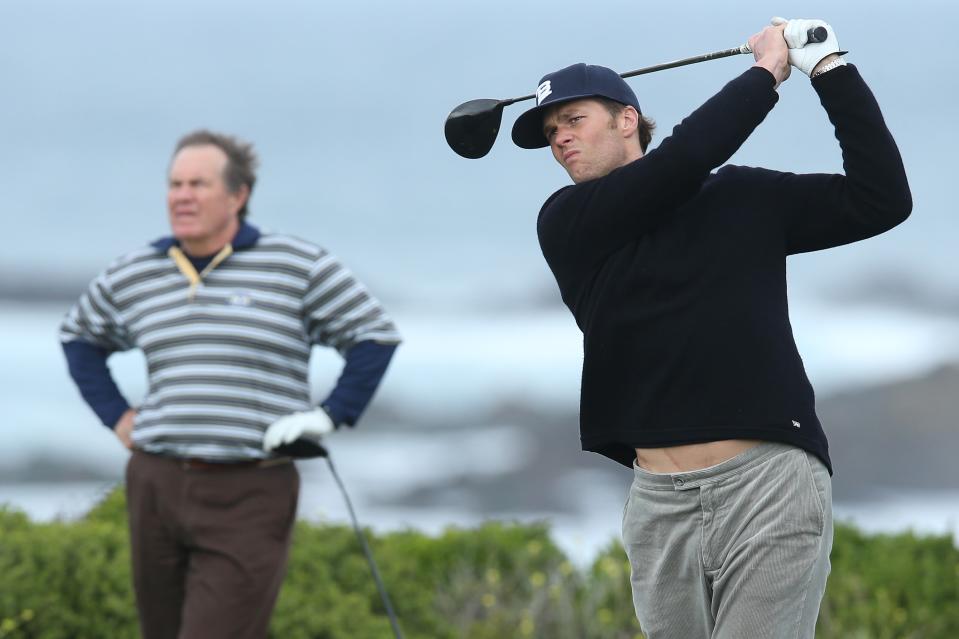 Bill Belichick and Tom Brady golfing. (Getty)