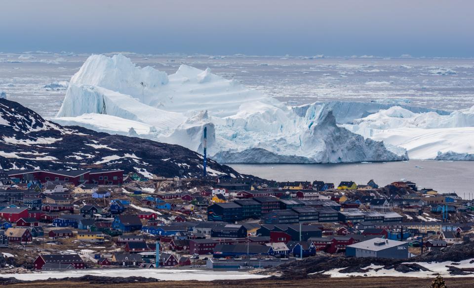 Icebergs near Ilulissat, Greenland. Climate change is having a profound effect in Greenland with glaciers and the Greenland ice cap retreating.