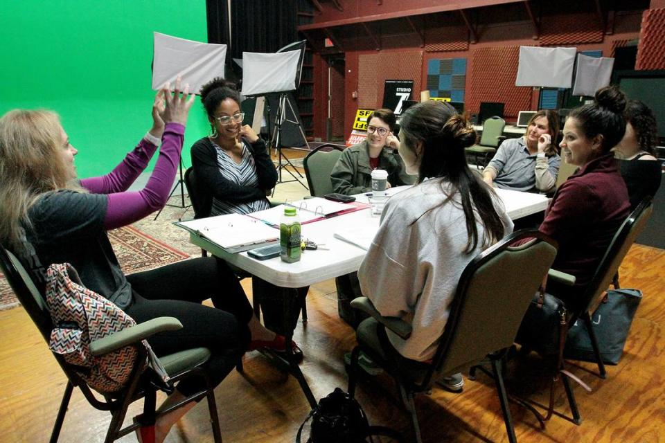 Springer Film Institute director Sara Lynn Herman, left, and playwright Natalia Temesgen, second from left, lead rehearsals for their upcoming webseries “Grounds,” which will be filmed over two days at Fountain City Coffee. The five-episode show is a series of five-minute vignettes that portray a day in the life of a Columbus coffeehouse. Columbus-natives Temesgen wrote the series, and Herman and her husband, Institute producer Jef Holbrook, will direct the production.