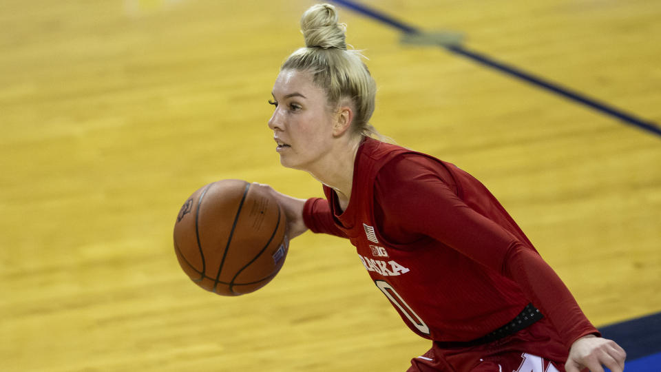 Nebraska guard Ashley Scoggin (0) dribble the ball against Creighton during an NCAA college basketball game on Monday, Dec. 14, 2020, in Omaha, Neb. (AP Photo/John Peterson)