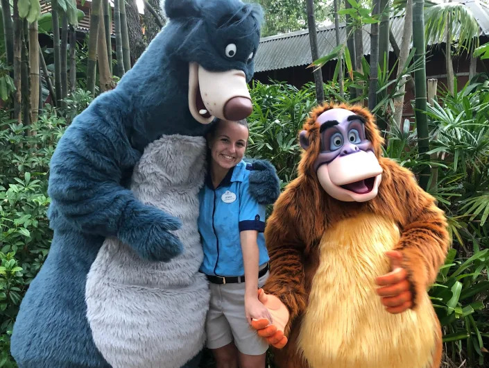 jenna working as a character attendant with jungle book characters at disney world