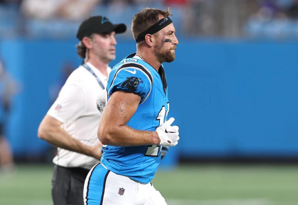 Carolina Panthers wide receiver Adam Thielen jogs off the field after being shaken up following a pass reception during first quarter action against the Detroit Lions on Friday, August 25, 2023 at Bank of America Stadium in Charlotte, NC.