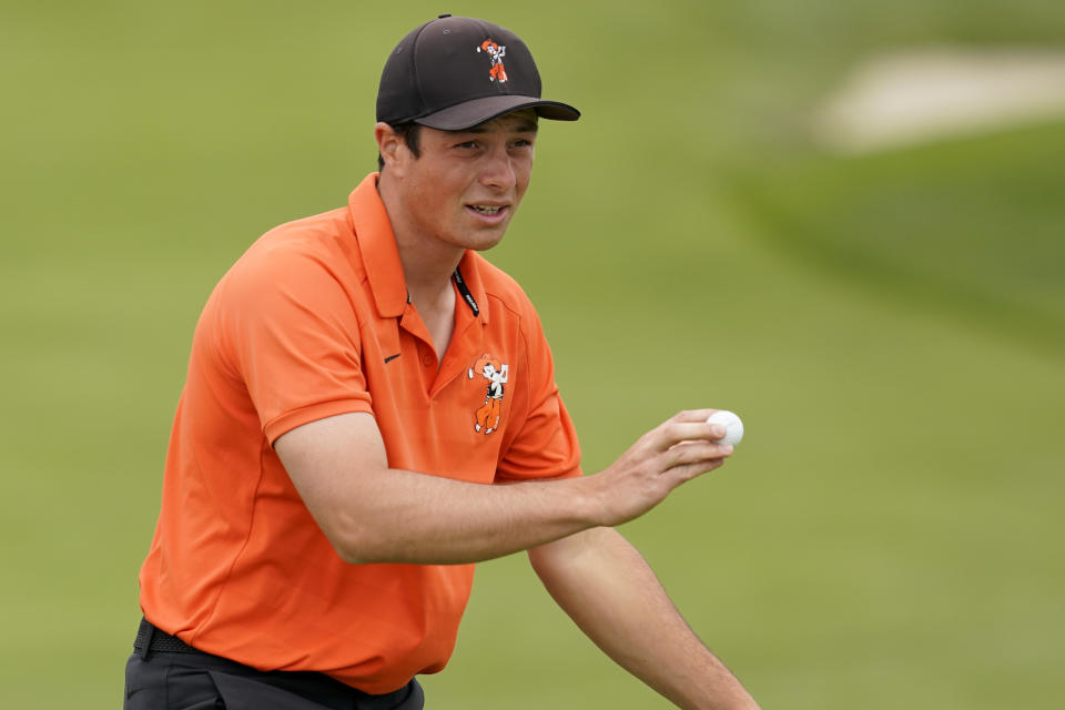 Amateur player, Viktor Hovland, of Norway, waves after his birdie putt on the sixth hole during the final round of the U.S. Open Championship golf tournament Sunday, June 16, 2019, in Pebble Beach, Calif. (AP Photo/David J. Phillip)