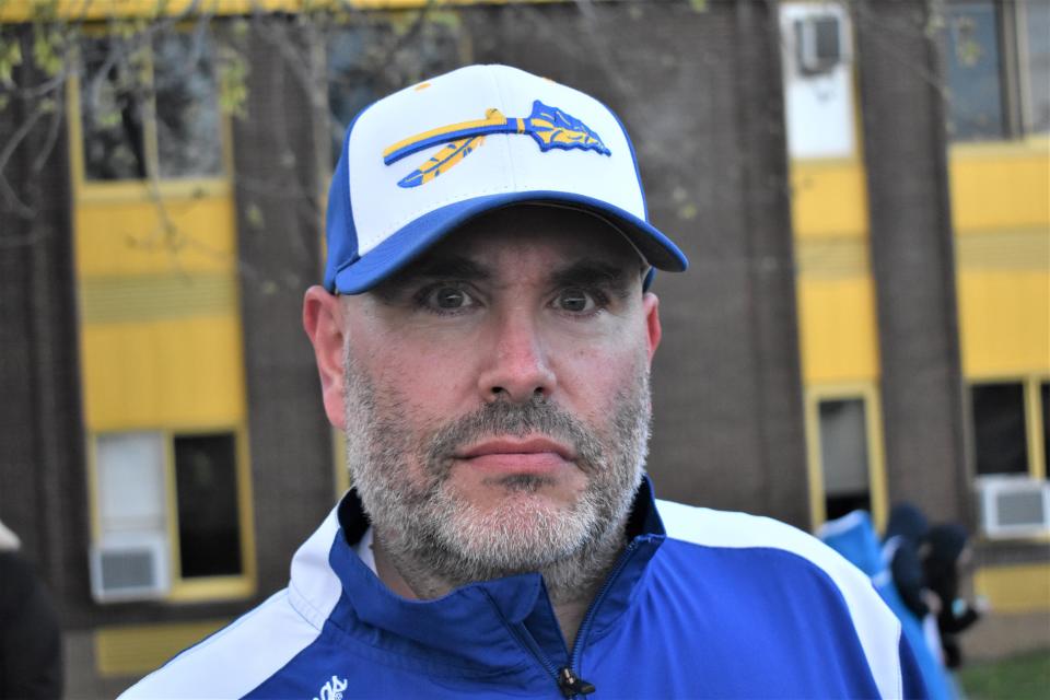 Ryan Leone, freshman baseball coach at Mahopac High, wore the Mahopac baseball cap, emblazoned with the image of a Native American spear and feather. The hat will be replaced within the next two years.