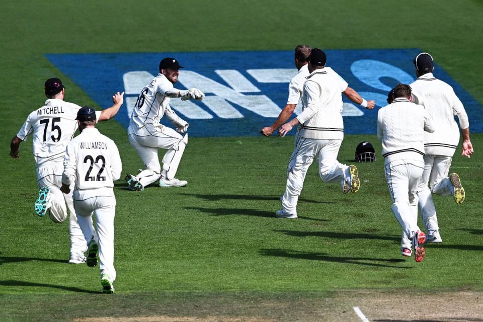 Stunning: James Anderson was caught with England needing two to win  (AP)