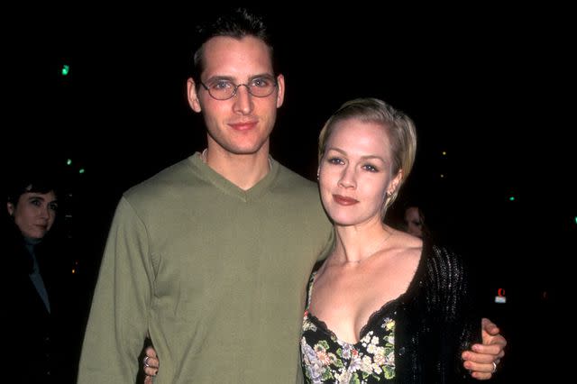 <p>Ron Galella/Ron Galella Collection via Getty</p> Jennie Garth and Peter Facinelli at the premiere of his film 'Telling You' in 1998.