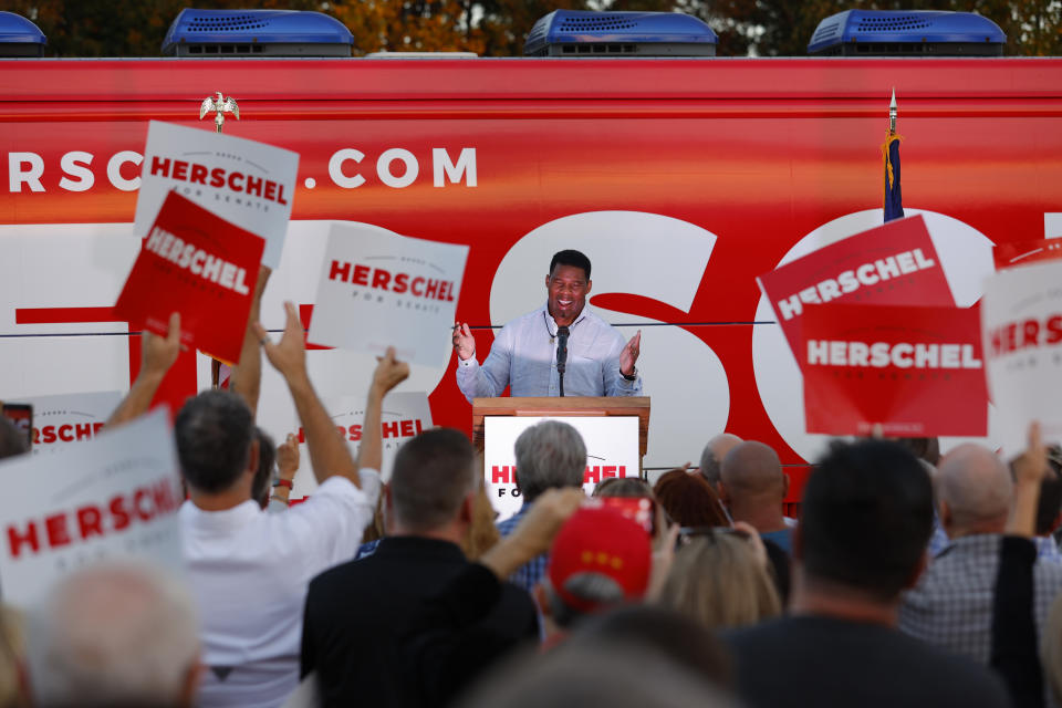 FILE - Herschel Walker, the Republican candidate for U.S. Senate in Georgia, speaks during a campaign stop in Smyrna, Ga., Nov. 3, 2022. Walker is in a runoff election with incumbent Democratic Sen. Raphael Warnock. (AP Photo/Todd Kirkland, File)