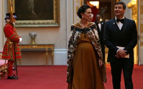 New Zealand's Prime Minister Jacinda Ardern (L) arrives to attend The Queen's Dinner during The Commonwealth Heads of Government Meeting (CHOGM), at Buckingham Palace in London - Credit: DANIEL LEAL-OLIVAS /AFP