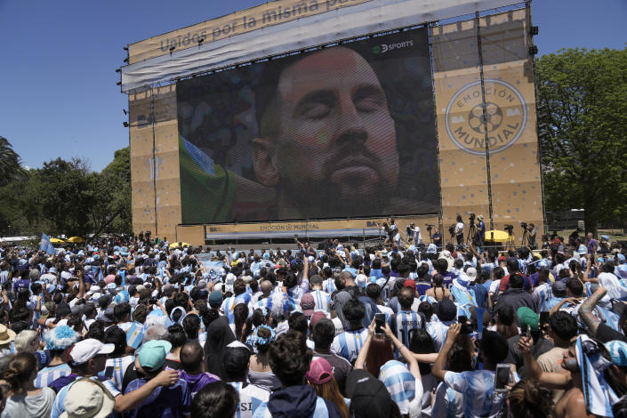 Argentina's soccer fans watch on big screens the World Cup final soccer match between Argentina and France in Buenos Aires, Argentina, Sunday, Dec. 18, 2022. (AP Photo/Rodrigo Abd)