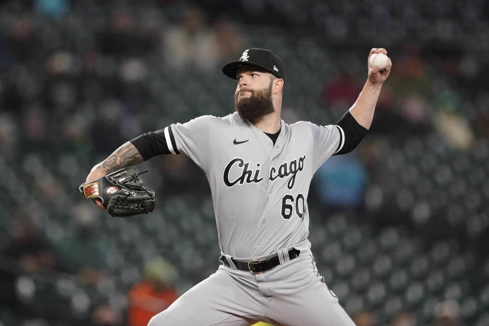 Chicago White Sox starting pitcher Dallas Keuchel throws against the Seattle Mariners during the first inning of a baseball game, Wednesday, April 7, 2021, in Seattle. (AP Photo/Ted S. Warren)