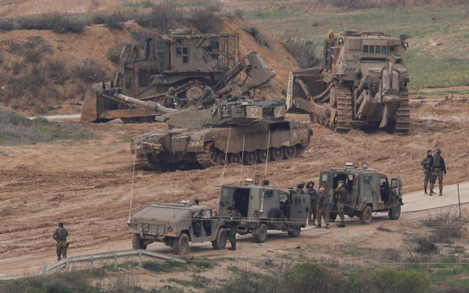 Israeli military vehicles gather