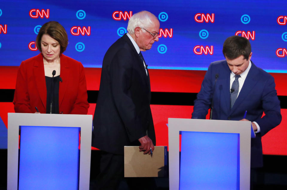 U.S. Senator Amy Klobuchar, U.S. Senator Bernie Sanders and South Bend Mayor Pete Buttigieg (R) pause during a commercial break on the first night of the second 2020 Democratic U.S. presidential debate in Detroit, Michigan, U.S., July 30, 2019. REUTERS/Lucas Jackson