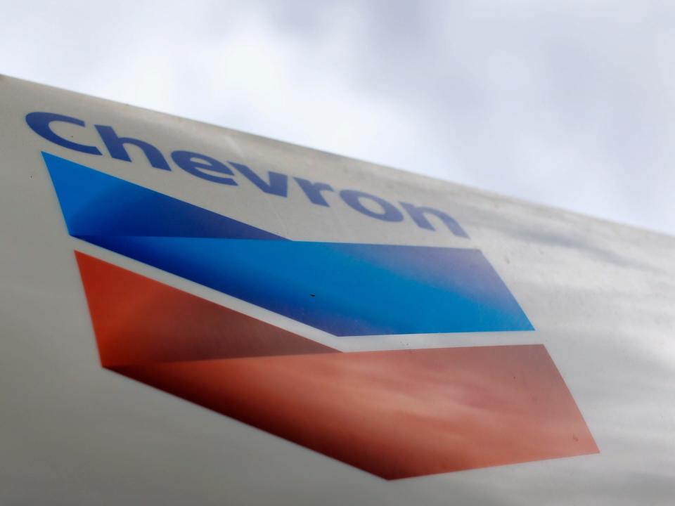 FILE PHOTO: A Chevron gas station sign is pictured at one of their retain gas stations in Cardiff, California October 9, 2013. REUTERS/Mike Blake