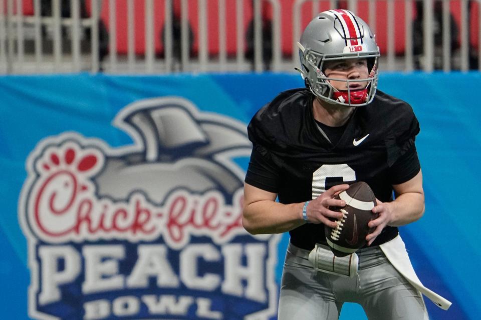 Dec 29, 2022; Atlanta, GA, USA;  Ohio State Buckeyes quarterback Kyle McCord (6) drops back to throw during a team practice for the Peach Bowl game against the Georgia Bulldogs in the College Football Playoff semifinal at Mercedes Benz Stadium. Mandatory Credit: Adam Cairns-The Columbus Dispatch