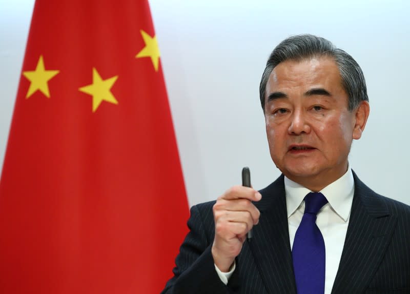 FILE PHOTO: Chinese Foreign Minister Yi attends a news conference after a meeting wtih Swiss Foreign Minister Cassis in Bern