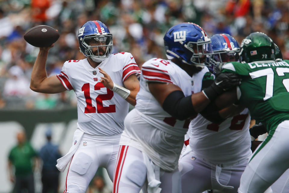 New York Giants quarterback Davis Webb (12) passes in the first half of a preseason NFL football game against the New York Jets, Sunday, Aug. 28, 2022, in East Rutherford, N.J. (AP Photo/John Munson)