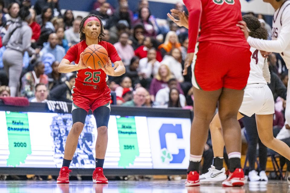 Lawrence North High School sophomore Ke'Adriah Butler (25) makes a pass to a teammate during the second half of an IHSAA Class 4A Sectional semi-final basketball game against Lawrence Central High School, Friday, Feb. 2, 2024, at Cathedral High School. Lawrence Central won, 61-54.