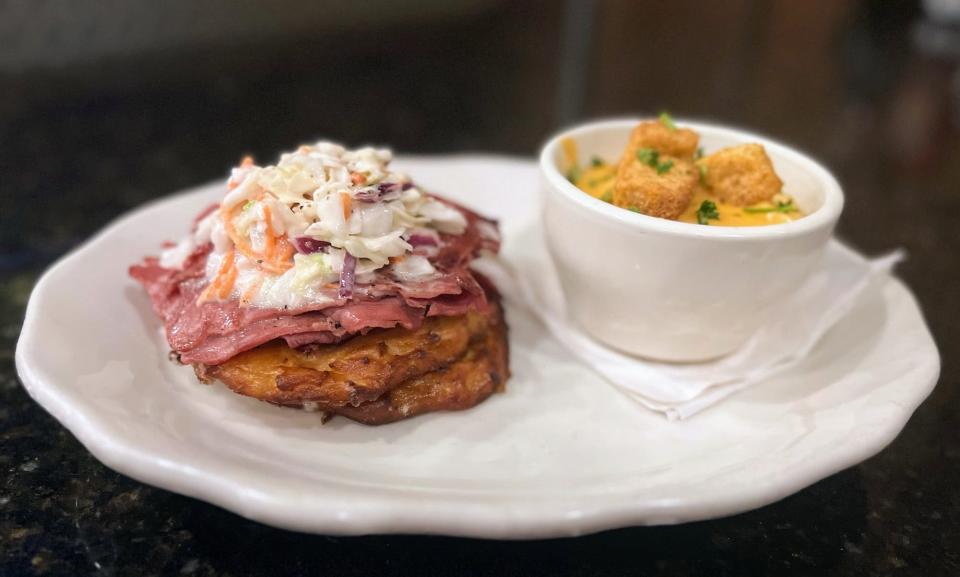 Corned Beef Boxty Stack, at McCracken's Irish Pub comprises hot corned beef and coleslaw over a two boxty stack (potato pancakes) with soup (or salad, not pictured).